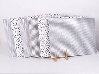 All six placemats on stand showing designs