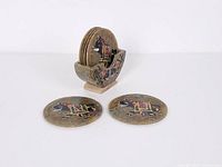 Set showing coasters in holder and two laid flat