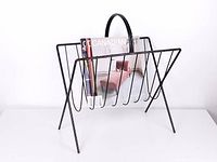 Front angled view showing overall form and magazines for scale (not included)