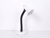 Full view of white metal desk lamp with black flexible neck on round base