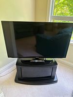 Full view of Samsung TV on stand