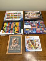 All six puzzle boxes displayed on table