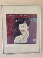 Full view of framed autographed Duran Duran “Rio” album cover