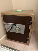 Front view of ED Safe showing combination dial, lever handle and branding