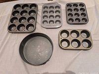 All five bakeware pieces laid out