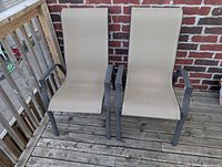 Front view of both chairs showing frames, mesh and overall condition