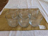 All six clear tumblers top view