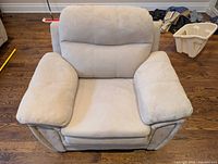 Front view of tan suede armchair