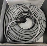 Coiled 150ft grey Starlink ethernet cable in box