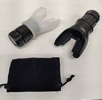 Both lung capacity trainers and storage pouch displayed