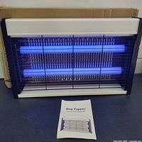 Front view of Morole bug zapper with manual