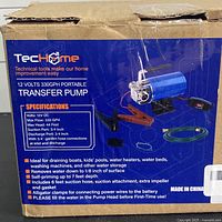 Box panel showing TecHome 12V transfer pump specifications