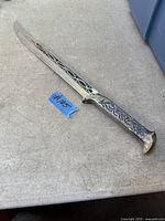 Full view of knife showing blade and handle