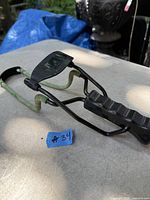 Overall view of slingshot showing frame, grip, band and pouch