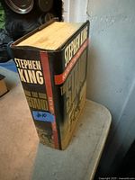 Spine and top of 2008 hardcover "The Stand" showing dust jacket and page edges