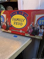 Front of The New Family Feud board game box on shelf
