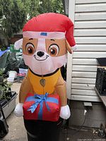 Full view of Gemmy Airblown Rubble inflatable with present