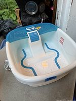 Top view of HoMedics electric foot bath showing basin, controls, cord