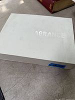 Closed white box embossed KKW FRAGRANCE