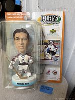 Front view of sealed Curtis Joseph Upper Deck Play Makers bobblehead package