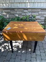 Top view of pine table with leaves down