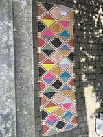 Full view of entire runner rug on stone surface