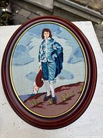 Front view of framed needlepoint artwork