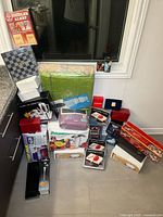 Overall lot showing all boxed items stacked together