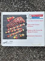 Front of box showing Barbecue Genius Cast Iron Cooking Grids