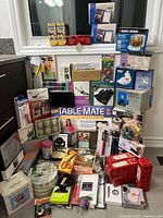 Overview of entire lot of boxed items stacked together