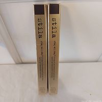 Two boxed Stila eyeliners front view
