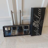Front view of boxed English Laundry gift set showing all four bottles