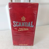 Front view of sealed red Scandal box