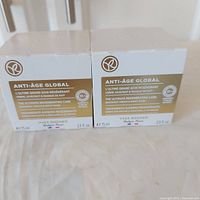 Front view of both sealed Yves Rocher Anti-Age Global 75 ml boxes