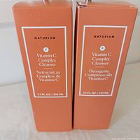 Front view of two boxed Naturium Vitamin C Complex Cleansers 210 mL