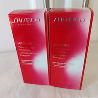 Front view of two sealed Shiseido Ultimune Power Infusing Concentrate 15 ml boxes