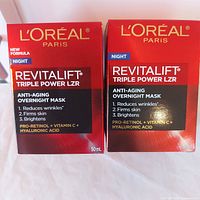 Front view of two sealed L'Oreal Revitalift Triple Power Overnight Mask boxes