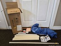 All components laid out beside original box