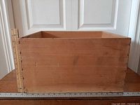 Side view showing overall size with rulers for scale