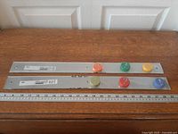 Both BAR magnetic strips with magnets and ruler for scale