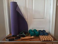 Full lot: yoga mat, dumbbells, resistance tubes, massage roller, metal bar