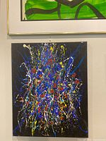 Framed view of the drip painting on wall