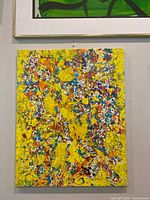 Full view of the abstract painting framed on wall