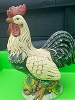 Front three-quarter view of ceramic rooster showing full figure and paint details