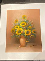 Full view of framed painting showing sunflower still life