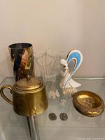 Group shot showing all items on glass shelf