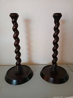 Full view of both oak barley twist candlesticks