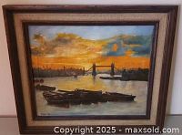 Front view of framed oil painting showing Tower Bridge sunset scene