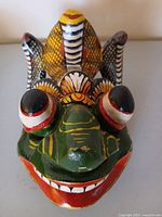 Front view showing full mask colours and features