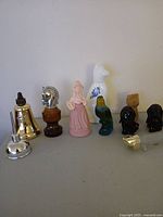 Full group of 10 Avon collectible perfume bottles